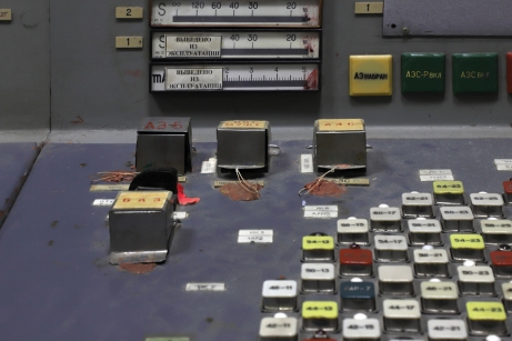 Control Room 3. The top left of these cube-shaped shielded buttons marked A3-5 – or ‘AZ-5’ – was the ‘scram’ kill switch. This manually operated control would immediately terminate the fission reaction by inserting all the control rods at once. In neighbouring Control Room 4, on 26 April 1986 at 1.23.40am, this switch was flicked and a malfunction occurred, causing the meltdown. Chernobyl Exclusion Zone by Darmon Richter