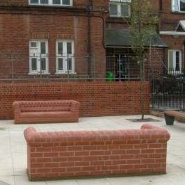 Brick sofa sculpture by Rodney Harris